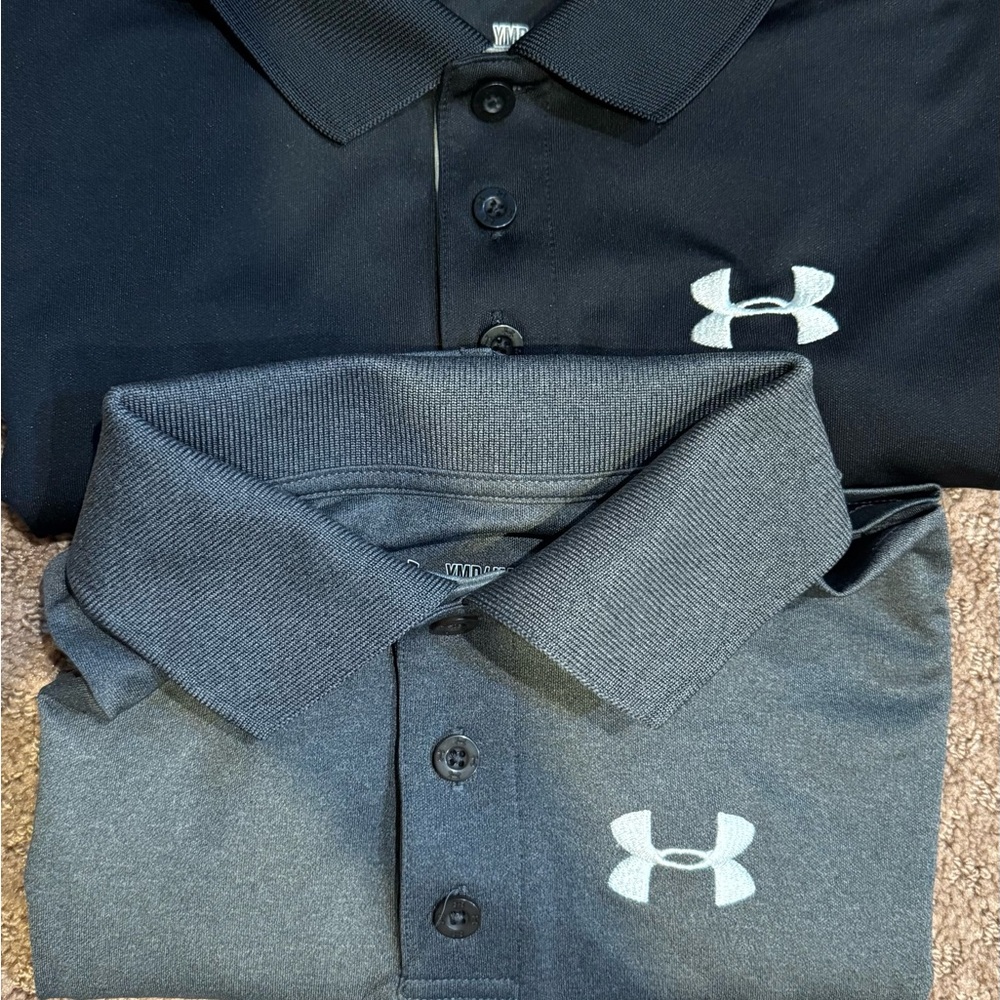 2 boys medium Under Armour polos for 1 price (black and gray) like new